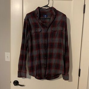 Flannel shirt with bleached Merry Christmas on back.
